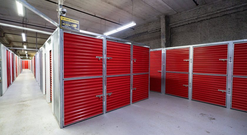 Interior view of XYZ Storage Etobicoke with small storage units featuring red doors.